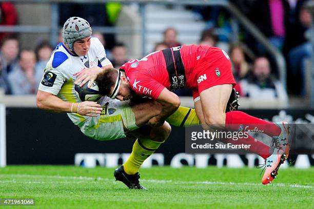 Jonathan Davies of Clermont is tackled by Drew Mitchell of Toulon during the European Rugby Champions Cup Final match between ASM Clermont Auvergne...