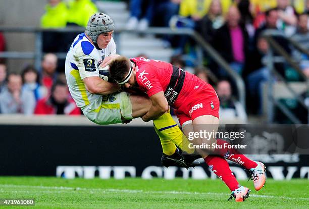Jonathan Davies of Clermont is tackled by Drew Mitchell of Toulon during the European Rugby Champions Cup Final match between ASM Clermont Auvergne...