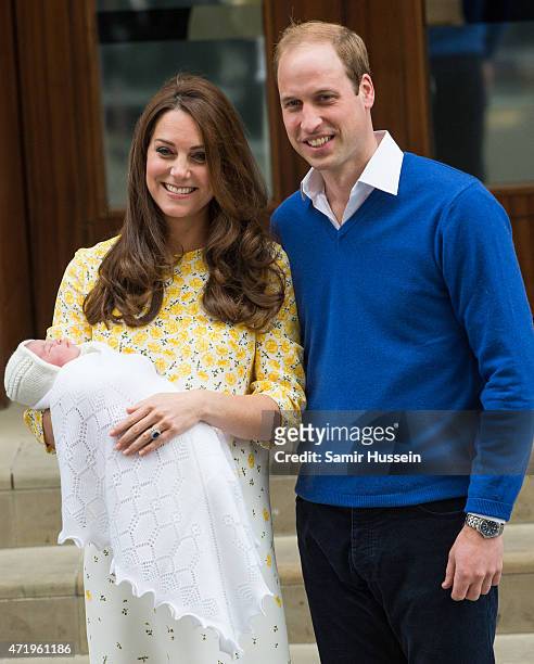 Prince William, Duke of Cambridge and Catherine, Duchess of Cambridge depart the Lindo Wing with their new baby at St Mary's Hospital on May 2, 2015...