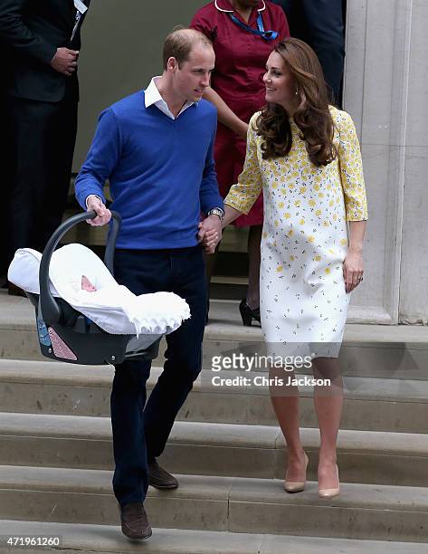 Catherine, Duchess of Cambridge and Prince William, Duke of Cambridge depart the Lindo Wing with their newborn daughter at St Mary's Hospital on May...