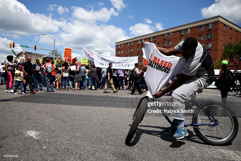 Rally Held In Baltimore Day After Charges Announced Against Officers Involved In Freddie Gray Death