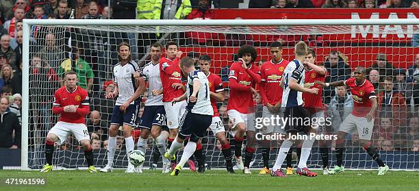 Chris Brunt of West Bromwich Albion scores their first goal during the Barclays Premier League match between Manchester United and West Bromwich...