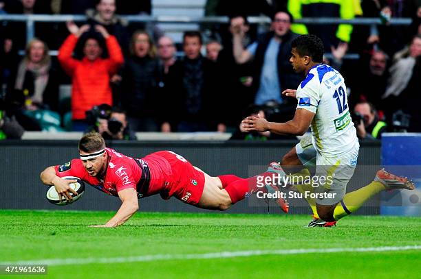 Drew Mitchell of Toulon dies past Wesley Fofana of Clermont to score his team's second try during the European Rugby Champions Cup Final match...