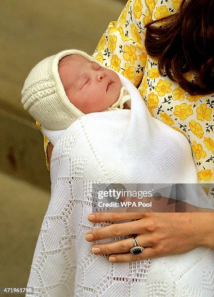 Catherine, Duchess of Cambridge and Prince William, Duke of Cambridge depart the Lindo Wing with their newborn daughter at St Mary's Hospital on May...