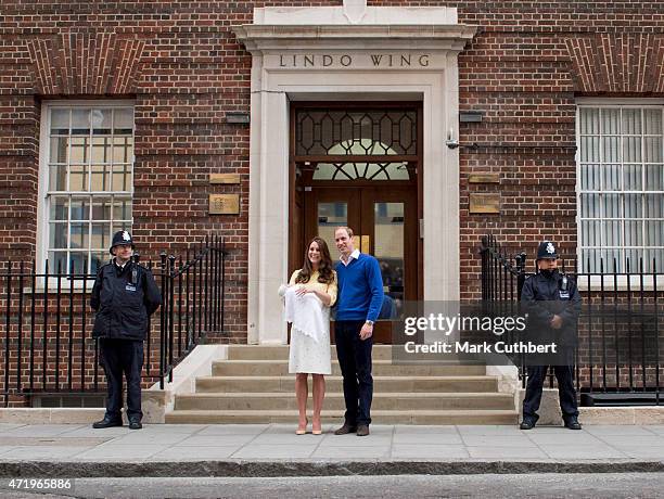 Prince William, Duke of Cambridge and Catherine, Duchess of Cambridge leave hospital with their new baby daughter at St Mary's Hospital on May 2,...