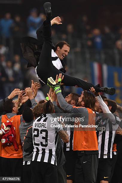 Massimiliano Allegri head coach of Juventus FC is lifted by his players at the end of the Serie A match between UC Sampdoria and Juventus FC at...