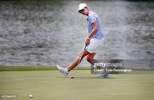 Karrie Webb of Australia reacts to a putt on the 18th green during Round Three of the 2015 Volunteers of America North Texas Shootout Presented by...