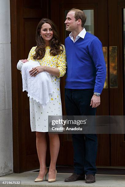 Prince William, Duke of Cambridge and Catherine, Duchess of Cambridge posing to media outside The Lindo Wing with their newborn girl at St Mary's...
