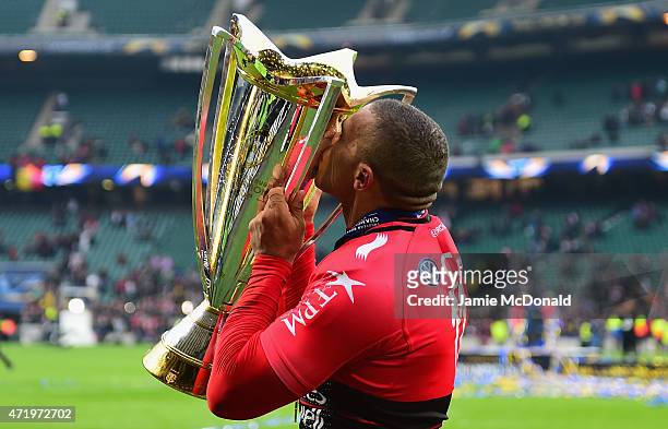 Bryan Habana of Toulon celebrates with the trophy following his team's victory during the European Rugby Champions Cup Final match between ASM...