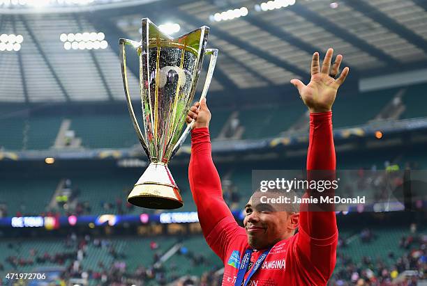 Bryan Habana of Toulon celebrates with the trophy following his team's victory during the European Rugby Champions Cup Final match between ASM...