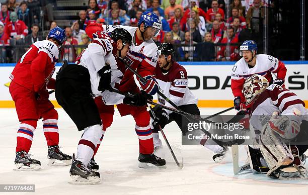Edgars Masalskis , goaltender of Latvia saves the shot ofJaromir Jagr of Czech Republic during the IIHF World Championship group A match between...
