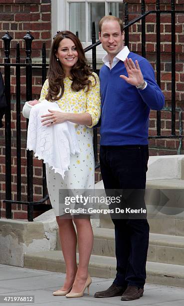 Catherine, Duchess of Cambridge and Prince William, Duke of Cambridge leave The Lindo Wing of St Mary's Hospital with their newborn daughter,...