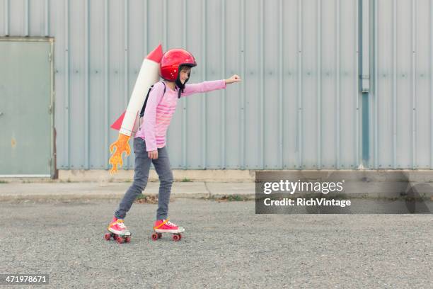 rocket girl - jet pack stock pictures, royalty-free photos & images