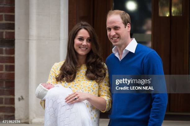 Britain's Prince William and Catherine, Duchess of Cambridge show their newly-born daughter, their second child, to the media outside the Lindo Wing...
