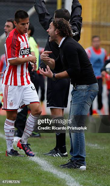 Gabriel Milito coach of Estudiantes gives instructions to his players during a match between Olimpo and Estudiantes as part of 11th round of Torneo...