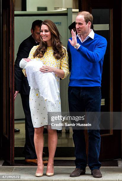 Prince William, Duke of Cambridge and Catherine, Duchess of Cambridge depart the Lindo Wing with their newborn baby daughter at St Mary's Hospital on...