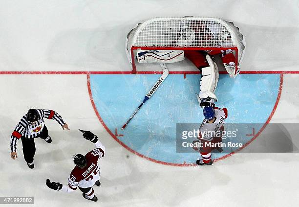 Alexander Salak , goaltender of Czech Republic slides into tge net during the IIHF World Championship group A match between Latvia and Czech Republic...
