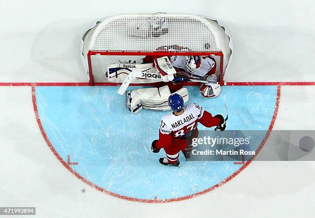 Alexander Salak , goaltender of Czech Republic slides into tge net during the IIHF World Championship group A match between Latvia and Czech Republic...
