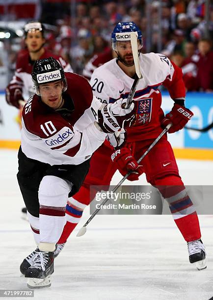 Lauris Darzins of Latvia fires a shot at goal during the IIHF World Championship group A match between Latvia and Czech Republic at o2 Arenaon May 2,...