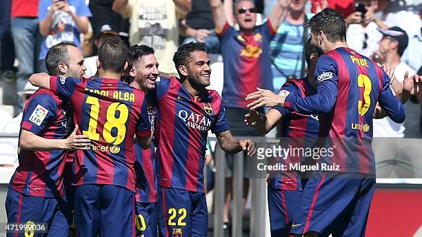 Luis Suarez of FC Barcelona celebrates with his team-mates as he scored the second goal during the La Liga match between Cordoba CF and FC Barcelona...
