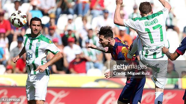 Lionel Messi of FC Barcelona heads the ball during the La Liga match between Cordoba CF and FC Barcelona at Nuevo Arcange on May 2, 2015 in Cordoba,...