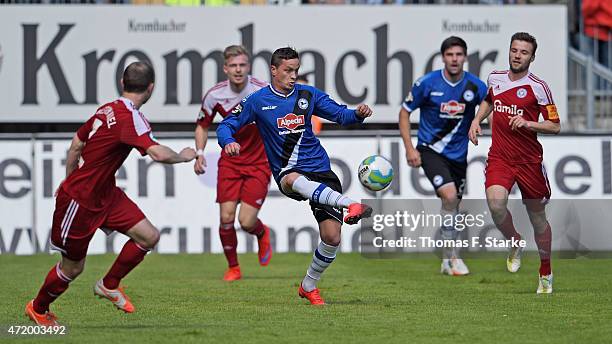 Christian Mueller of Bielefeld kicks the ball during the Third League match between Arminia Bielefeld and Holstein Kiel at Schueco Arena on May 2,...