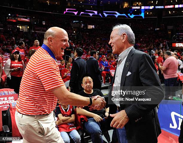 Clippers owner Steve Ballmer and Spurs owner Peter Holt shake hands before a basketball game between the San Antonio Spurs and Los Angeles Clippers...