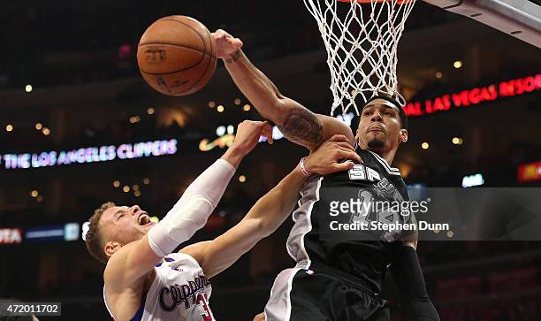Danny Green of the San Antonio Spurs blocks a shot by Blake Griffin of the Los Angeles Clippers during Game Seven of the Western Conference...
