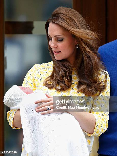 Catherine, Duchess of Cambridge leaves the Lindo Wing with her newborn daughter at St Mary's Hospital on May 2, 2015 in London, England. The Duchess...