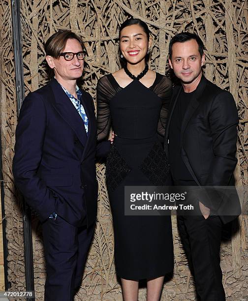 Vogue Editor-at-large Hamish Bowles, model Liu Wen and ?Head of Kering Americas Laurent Claquin attend Liu Wen, Wendi Murdoch, Laurent Claquin x...