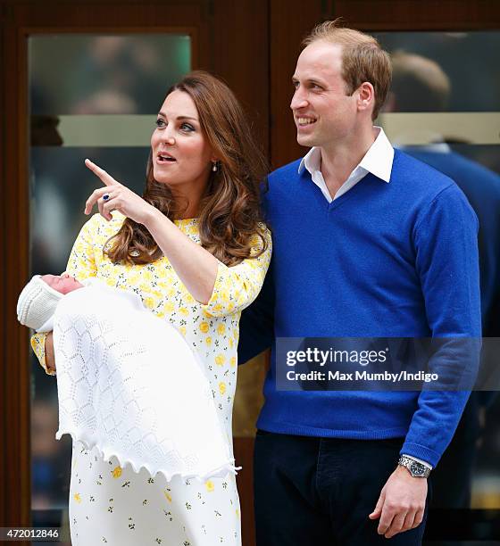 Catherine, Duchess of Cambridge and Prince William, Duke of Cambridge leave the Lindo Wing with their newborn daughter at St Mary's Hospital on May...