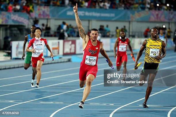 Ryan Bailey of the United States celebrates after winning the final of the mens 4 x 100 metres on day one of the IAAF World Relays at Thomas...