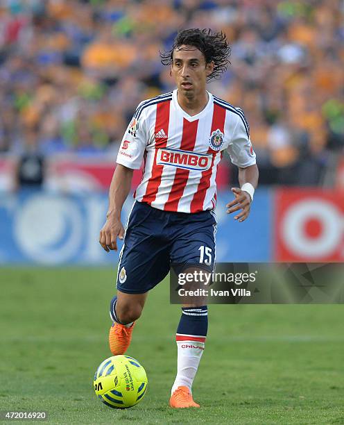 Fernando Arce of Chivas drives the ball during a match between Tigres UANL and Chivas as part of 16th round of Clausura 2015 Liga MX at Universitario...
