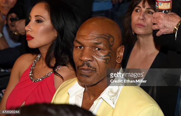 Former boxer Mike Tyson and his wife Lakiha "Kiki" Tyson sit ringside at "Mayweather VS Pacquiao" presented by SHOWTIME PPV And HBO PPV at MGM Grand...