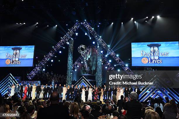 The cast and crew of 'Days of Our Lives' accept the award for Outstanding Drama Series onstage during The 42nd Annual Daytime Emmy Awards at Warner...