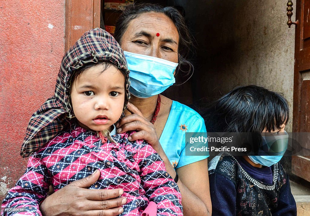 Kalplna with her child. The Nepal earthquake of 2015 or...