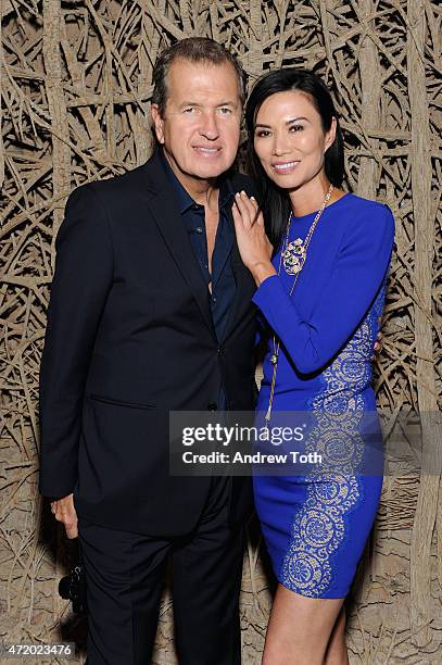 Photographer Mario Testino and Wendi Murdoch attend Liu Wen, Wendi Murdoch, Laurent Claquin x Qeelin Host A Private Cocktail Party To Celebrate The...
