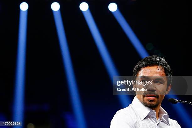 Manny Pacquiao answers questions during the post-fight news conference after losing to Floyd Mayweather Jr. In their welterweight unification...