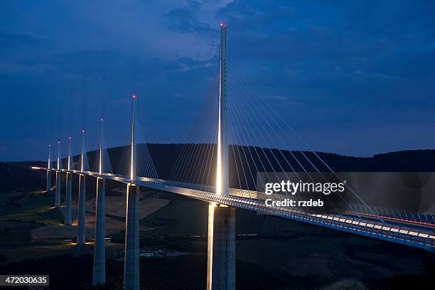 millau bridge at night - france - millau viaduct stock pictures, royalty-free photos & images