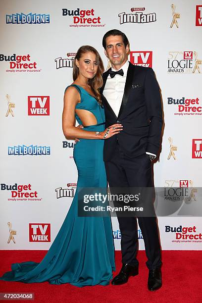 Rebecca Harding and Andy Lee arrive at the 57th Annual Logie Awards at Crown Palladium on May 3, 2015 in Melbourne, Australia.