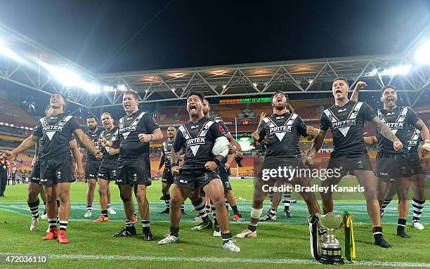 Issac Luke of the Kiwis and team mates perform the Haka as they celebrate their victory after the Trans-Tasman Test match between the Australia...