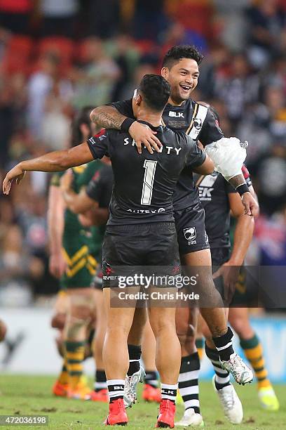 Issac Luke and Roger Tuivasa-Sheck of New Zealand celebrate winning the Trans-Tasman Test match between the Australia Kangaroos and the New Zealand...