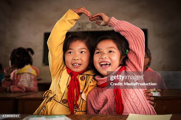 chinese school children - poverty stock pictures, royalty-free photos & images