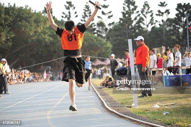 runner at the finish line - reaching the end stock pictures, royalty-free photos & images