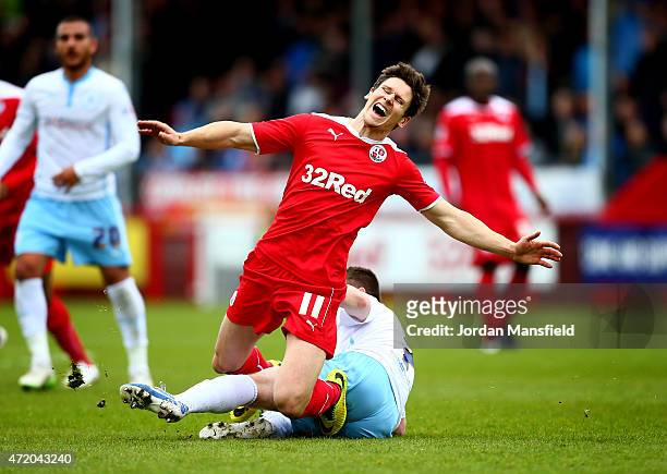 Josh Simpson of Crawley is tackled by John Fleck of Coventry during the Sky Bet League One match between Crawley Town and Coventry City at The...