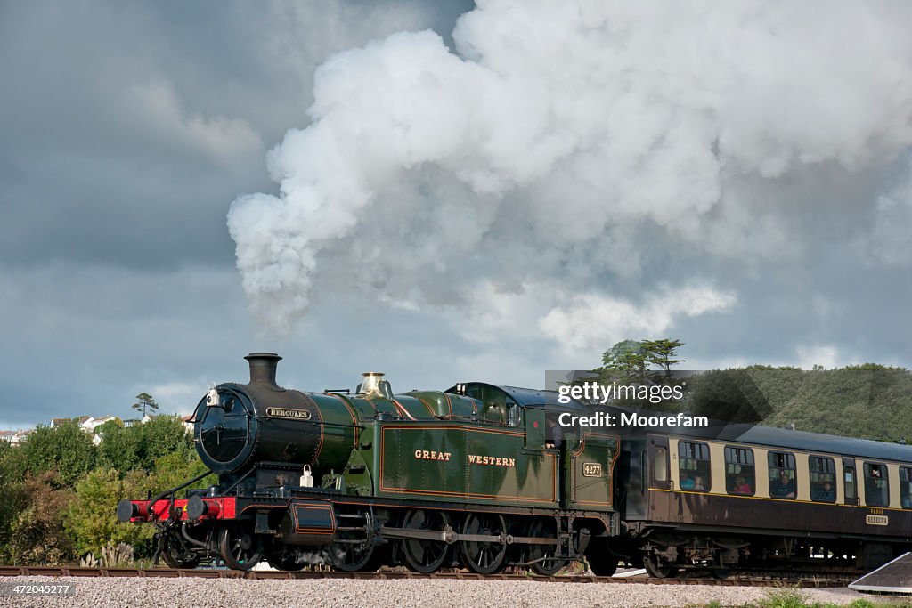 Dartmouth Steam Railway train pulling tourists out of Goodrington Sands