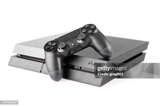 console playstation 4 and pad dualshock on white background - playstation stock pictures, royalty-free photos & images