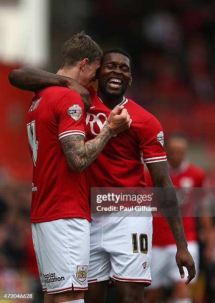 Aden Flint of Bristol City celebrates with Jay Emmanuel-Thomas after scoring the first goal for Bristol City during the Sky Bet League One match...