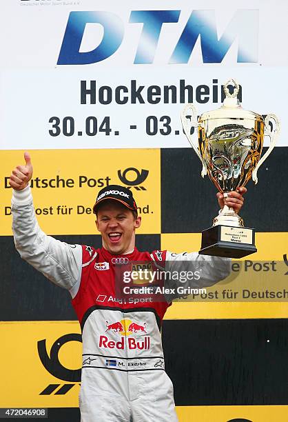 Mattias Ekstroem of Sweden and Audi Sport Team Abt Sportsline celebrates winning the second race of the DTM 2015 German Touring Car Championship at...