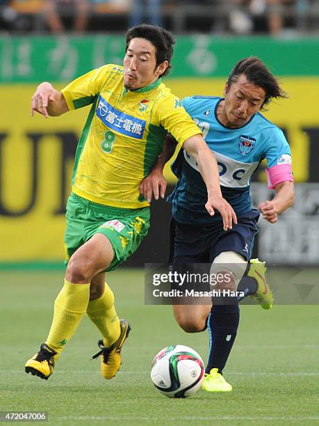 Tatsuya Yazawa of JEF United Chiba and Shinichi Terada of Yokohama FC compete for the ball during the J.League second division match between JEF...